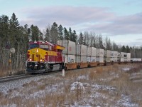 Q 11791 21 with the Wisconsin Central heritage unit, rolls through Rosevear, Alberta after meeting 180 at Peers.  
