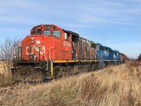 CN L568 is just west of Baden, Ontario on the Guelph Subdivision as it heads westbound to Stratford with light power. The consist included; 4784, GMTX 2248, GMTX 2254 and 4116. November 26, 2019.