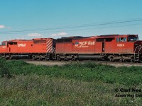 CP train 418 has just received a fresh crew and is preparing to depart Cartier southbound to Sudbury with 9022 and 9024. Once at Romford, this train will either diverge to Montreal or Toronto. 