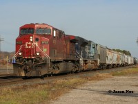 CP 241 with 9732 and UP 1982 (the MoPac heritage unit) rolls through Ayr, Ontario on the Galt Subdivision with work ahead at Wolverton yard during a sunny November afternoon. 