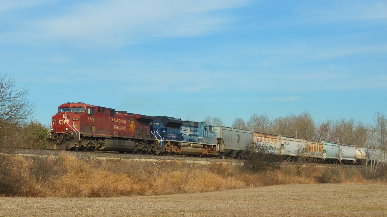 Day 3 of a rail-filled weekend: cool and breezy but a sunny end-of-November day. 
CP 9732 and UP (Mopac Heritage) 1982 on train #241 westbound approaching the siding at Puslinch, ON.
