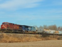 Day 3 of a rail-filled weekend: cool and breezy but a sunny end-of-November day. 
CP 9732 and UP (Mopac Heritage) 1982 on train #241 westbound approaching the siding at Puslinch, ON.

