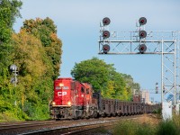 With about 2 seconds before the clouds screwing me over entirely, CP 6256 leads a westbound CWR out of Lambton Long-Hood-Forward on a nice September afternoon. It was a very odd but cool sight for sure, I was told 6024 was the original leader (with 6256 trailing behind in the rear facing position) but ran into problems on the Mactier Sub somewhere which necessitated 6256 to lead. I assume there was not an available wye to put the units in the right position so they just said screw it.