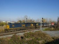 After waiting for VIA 67 to make its station stop on the south track and then cross over to the north track once it departed, CN 327 is on the move with rebuild CSXT 7208 leading (ex-CSXT 227), CSXT 903 trailing and only 49 cars.