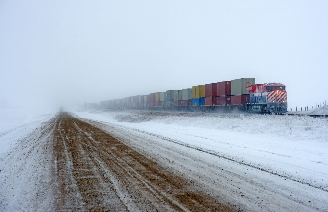 CN 183 is seen here at track speed east of Young Saskatchewan with 3115 on the point.