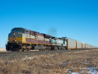 A sunny afternoon in sees 197 making it's way north on the Weyburn subdivision near the town of Lang Saskatchewan with a great consist.  CP 7012 and CEFX 1002 make for a wonderful change from the normal.  