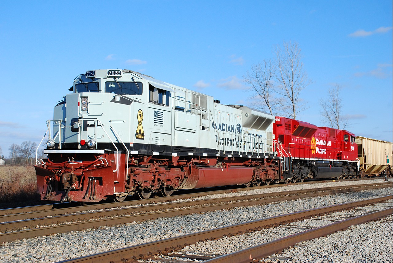 UP 1982 on CP 244.  CN 2441 leading CN 435.  CP 7022 leading CP 247.  Railfans in Southern Ontario had three great targets to go after this sunny Saturday.  The old man and I opted for option 3 and I'm glad we did.  The low autumn light nicely illuminated the red under-frame on CP 7022 as the train slowly pulled up to the north siding switch Welland to pick up the conductor.  We were surprisingly the only railfans at this location, so most must have went after other targets today.  There was one unconfirmed sighting of the Mooney-mobile shortly after our arrival but it failed to stop at our location.  It may have just been some geezer out for a drive with his lady friend.  Thanks to Bill Purdy and Jazzy Joe for the heads-up on 246 yesterday.  Lets see your shots from today!  And no Steve, I'm not pinching you.
