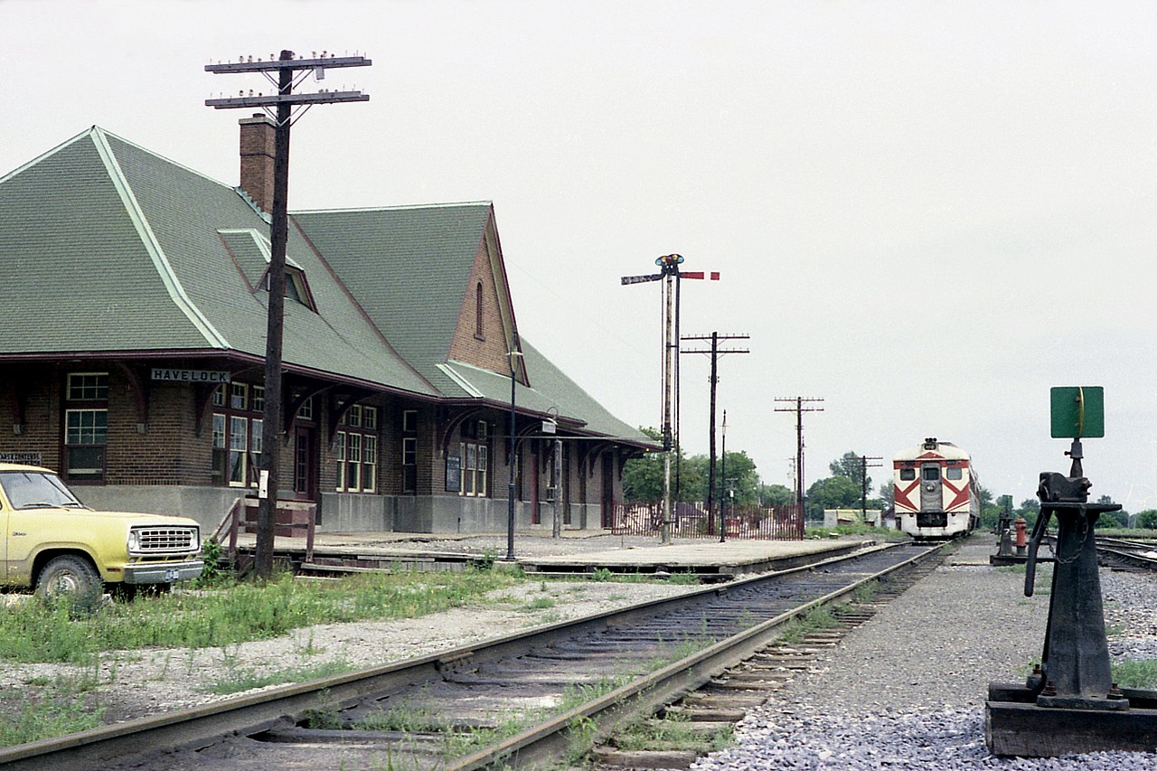A nice view looking eastward at the CP Budds 9070 and 9061 laying over on a Sunday.  The "Budd Run" is long gone but the station still remains in location; now a pizza restaurant as I understand it..