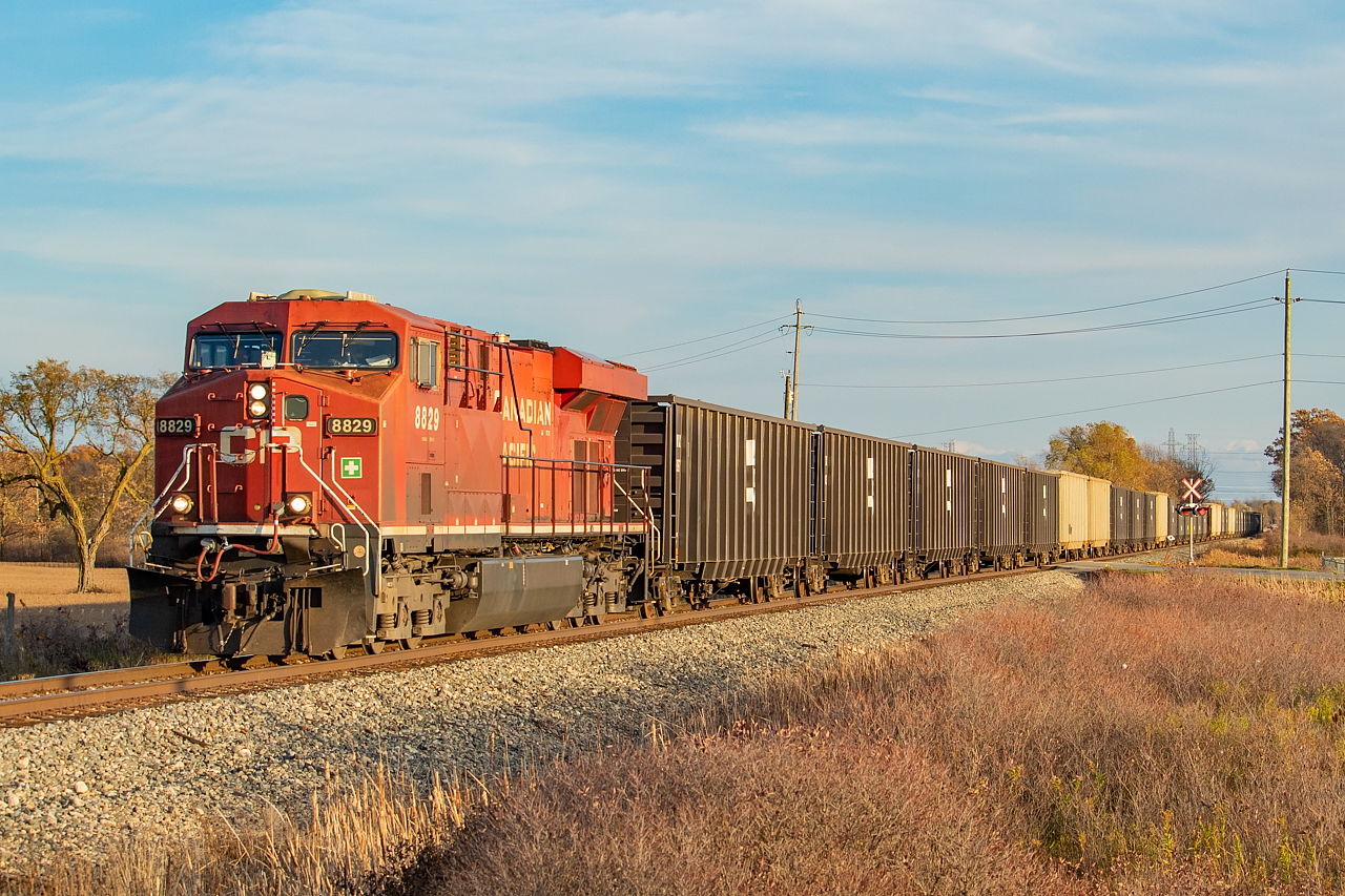 A somewhat unique looking 255: aside from three tanks towards the rear, the train was entirely AIMX (American Iron & Metal) gons and was running with a rear DPU. After a meet with 246 in Smithville (and 246 doing a roll by as 255 had set off the detector for dragging equipment), 255 was already making good time again by the time they'd reached here.