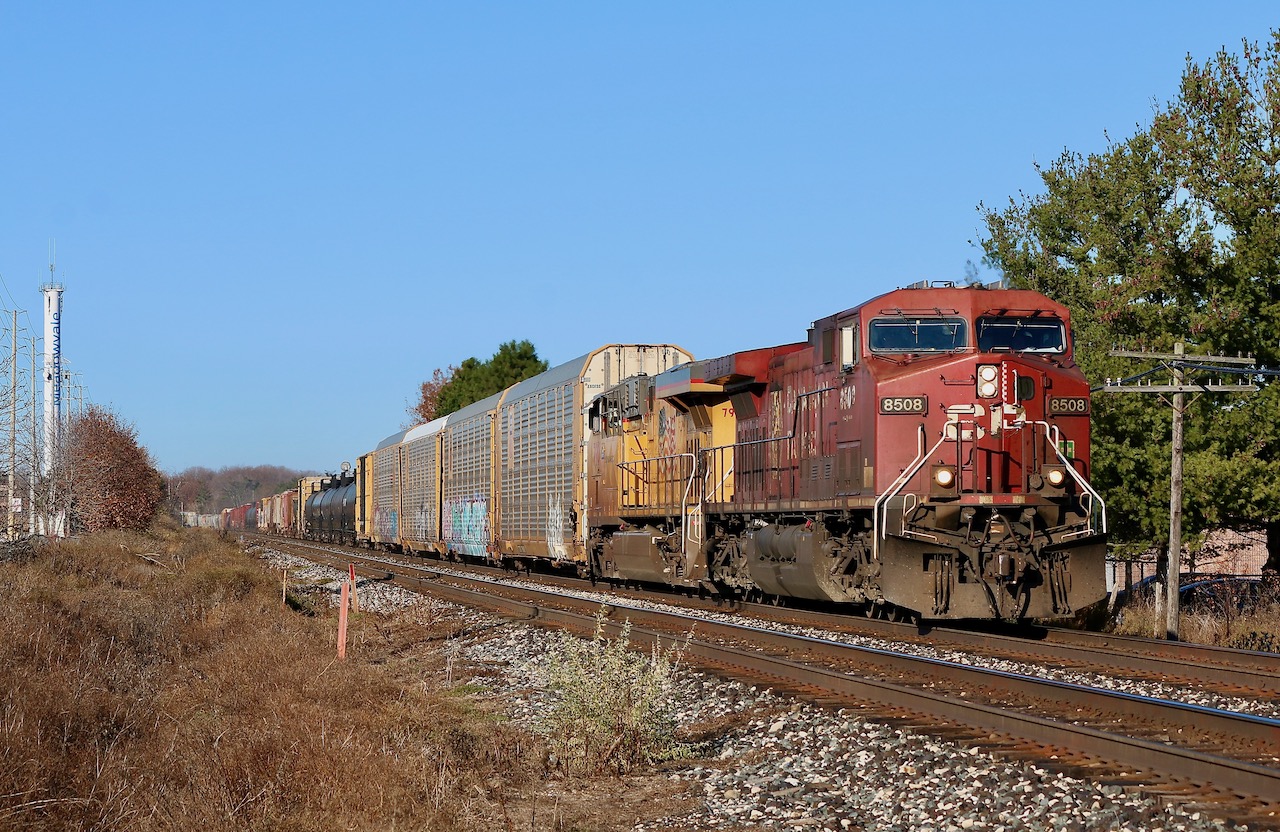 This is one of those locations I often overlook in Mississauga but considering it is in the city it is definitely one of the more open spots, especially for trains on the north track. Here CP train 234 with a CP/ UP combination has just passed the signal protecting the GO platform at Meadowvale station. Just like Milton and Lisgar there are only platforms on the north track. The old city water tower in the distance was converted a few years ago into a cell tower. Just out of sight to my left is the old severed bad order set off track, once used to hold bad order cars caught by the detector located at mile 25.