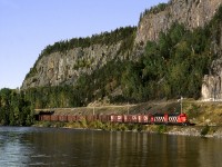 Hornepayne to Thunder Bay train 337 passes the rock bluffs along Lake Nipigon's Orient Bay. The bluffs are famous for ice climbers. The Kinghorn sub. was abandoned after the only customer, Domtar's Red Rock paper mill, closed and east traffic from Thunder Bay was handled in CP trains to Sudbury under a haulage agreement  