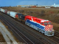 <b>First Heritage:</b>CN 3115 begins the heritage unit journey on CN as it departs with one leading for the first time destined for Montreal. Heads up to you Montreal folks! It begins..... thanks to CN for the hard work with these, it's going to be a very interesting fall/winter for photographers across this continent. Hopefully some folks @ CN head office see this - our photographers are more than willing to send you guys some pictures :) <br><br>Photo notes: 50mm f/1.8 for that sweet sweet low light.... and it was still not easy.