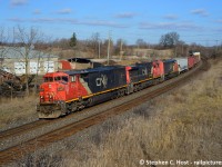 Hey. Hear that? White Zombie's More Human than Human is on the radio and this new thing called the Internet is taking the world by storm. 1995's knocking on your door and this trio of matching CN North America locomotives are in the lead of CN 435 on a beautiful fall day. Two cowls to boot, which we know are on borrowed time. Pinch me.