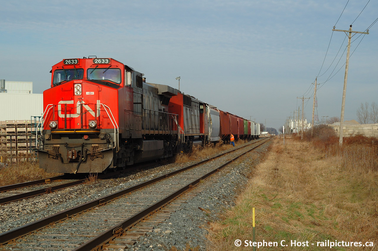 Back when CN 582 ran to St. Thomas in daylight (and 584 at night), OSR wasn't even in the picture and the St. Thomas and Eastern was the only shortline that ran into St. Thomas yard. NS still ran into St. Thomas when I took this picture (for a few more days), and CN and CP interchanged on the Wabash Transfer in St. Thomas as pictured above. Power from 386/7 was used on 582 which was just about anything on hand, such as seen in  this photo . A more mundane power set is shown on this day in December 2006 but to have this on the Wabash Transfer now..?? seems out of place. Only OSR uses this track today and no interchange occurs on it either.