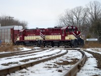 A pair of RS18's make a triumphant return to the St. Thomas subdivision after a long hiatus. Running for the first time since return from the Guelph Junction Railway, the crew is crossing the CNR diamond at Carew with 28 cars. It is great that MLW's are returning in regular rotation to OSR in Salford and this was a real nice treat to hear the familiar growl of these 251's with a good sized train.
<br><br>
I am curious if this is the first time a pair did run since OSR took over the St. Thomas subdivision from CP in December 2009. To make this happen 183 would have had to have still been in service and it would have had to be paired with 182. 183 has been out of service a long time, and I do not recall seeing it operate on the St. Thomas sub.  Anyone have evidence to the contrary? The power move on September 30 does not count for this purpose.  What do you think? Thank you for all responses.


