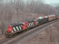 CN 4371 - CN 4105 head toward Hamilton through Bayview with two open autoracks loaded with Ford products from Oakville. CN 4371 would go on to be rebuilt as 7050 in 1992, and retired in July of 2000