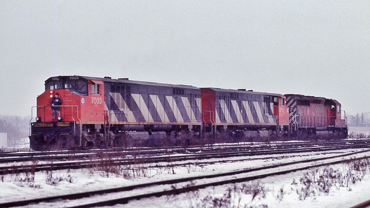those BBD demonstrators prowled CP Rail for 16 months: February 1983 to May 1984


 On a snowy day, BBD HR616, built 1982 by BBD ( at the former MLW 'works' ), BBD # 7002 – 7003 ( ex CN 2002 – 2003; and future CN 2002 – 2003 )  pull a 1980 built GMD SD40-2  ( CP Rail 5977 (?)) through the turnouts at the east end CP Rail Agincourt.


February 4, 1984 Kodachrome  by S.Danko
 

more BBD action: 
 

   on the high rail    
 

   in a sea of CP Rail    
 

   in the snow by darrell    


 sdfourty