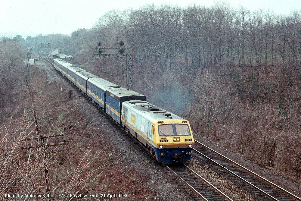 72 emerges off the Dundas Sub with LRC 6930 leading a steam generator, and 6 coaches on April 21, 1990