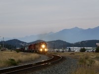 CP 5790 slowly slugs uphill with a total of 7 SD40-2's behind it. The train has been down on its knees since Fort Steele with the conductor having to fire up the CMQ 9023 to get them above 5 mph. The train consisted of the 8 SD40-2's and 65 empty ballast cars for the pit at Swansea. Engine ID's are in the following order; CP 5790, CP 6055, CP 6030, CP 6607, CP 6045, CMQ 9021, CMQ 9023, CP 6028. 