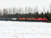 I suspect this will be one of the "highlight trains" in Southern Ontario this year. To help out, Mother Nature offered a monsoon just to add some "atmosphere"...large amounts of which fell from the sky. 

But here we have 650, in a downpour approaching Blandford Siding with 6232 followed by KCS 4132 and 4584; units that would have looked fabulous in even a muted sun.