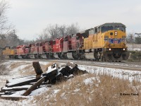 If I recall correctly, this train was CP 550, crude oil loads. It was definitely worth the chase from Orrs Lake to Campbellville. During the winter of 2015, the UP 90MACs frequented the area for a short period of time, so you bet I went out the door for this one! I think these engines have either been retired, scrapped, or some rebuilt. I believe a few were rebuilt into the new CP SD70ACUs, numbers 7058 and 7059, but not 100% sure. Also note the damaged locomotive and the ex-StL&H engine, followed by two more UP engines!