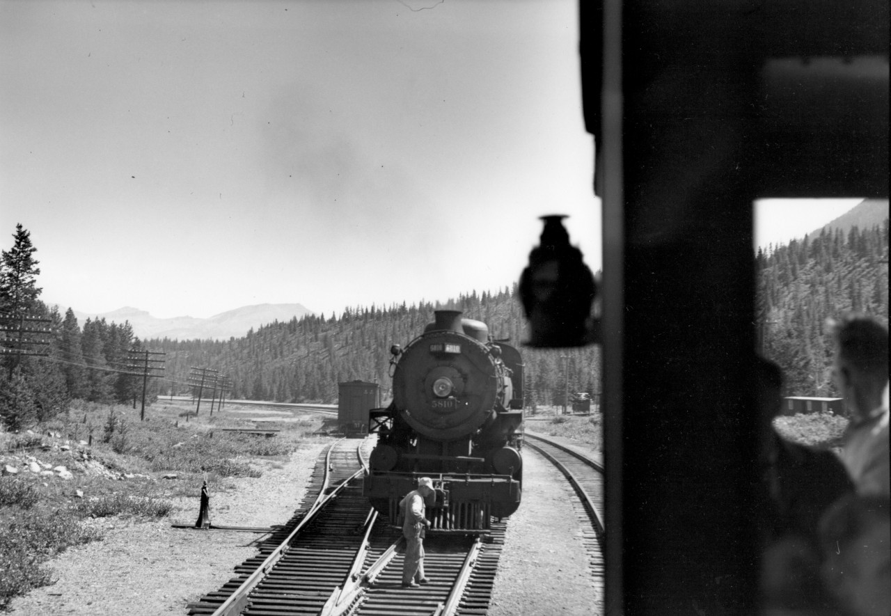Taken from observation car of train No. 2.  Helper engine 5810 in siding.  According to my father's notes it is east of Lake Louise.  Or possibly Stephen.