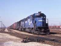  End of the line. Conrail ELDW-6 (Elkhart IN-Detroit/Windsor) with GP40-2 3340 and SD40-2 6442 stops at the South end of Track 5 in the Electric Yard, named so due to being in 3rd Rail electrified territory during the steam era. The American crew will then cut off and return light engines back to West Detroit.  The Electric Yard was numbered tracks 1, 3, 5, 7 and Short 9 (Switching lead) on the East side of the pole line. Tracks 2, 4, 6, 8 and 10 were on the West side although only tracks 2 and 10 remain at this time. The cars in the distance on the right are in the CR-CP Interchange tracks. Taken Feb 27th 1985 just two months before CN-CP will take over the Conrail trackage (CASO) in Southern Ontario. 