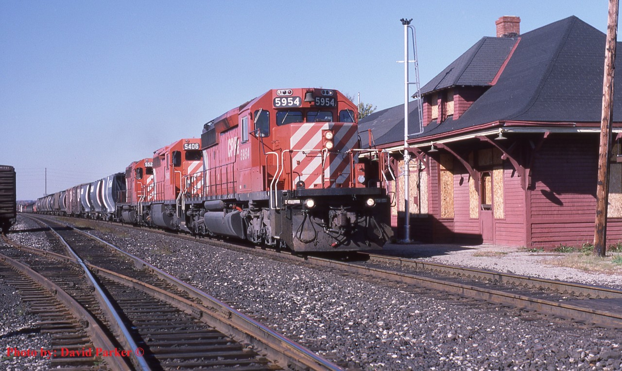 A commonplace trio of CP SD40/40-2's bring train No 446 past the abandoned Bolton Station on Oct 13th 1987. One of the RTC's I worked with at CP, her Father was the Station Agent here and she grew up living in the Station.