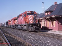  A commonplace trio of CP SD40/40-2's bring train No 446 past the abandoned Bolton Station on Oct 13th 1987. One of the RTC's I worked with at CP, her Father was the Station Agent here and she grew up living in the Station. 