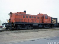 Abitibi-Price RS3 1310 is pictured at Iroquois Falls in September 1993. The unit is former Ontario Northland 1310 (see Arnold Mooney's photo <a href=http://www.railpictures.ca/?attachment_id=43637><b>here</b></a>), and was acquired for switching Abitibi-Price's paper mill in Iroquois Falls in 1985 (AP had previously acquired Ontario Northland S4 1203 in the 70's as a plant switcher). In 1995, 1310 was acquired by the <a href=http://www.railpictures.ca/?attachment_id=27632><b>York-Durham Heritage Railway</b></a> out of Uxbridge, where it still operates today with it original number.