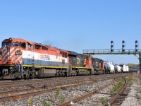 BCOL 4608, CN 2257, and CN 5774 lead A43531 23 through the Junction with 144 cars