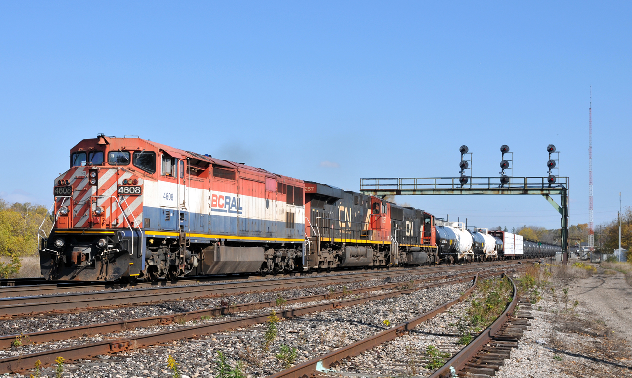 BCOL 4608, CN 2257, and CN 5774 lead A43531 23 through the Junction with 144 cars