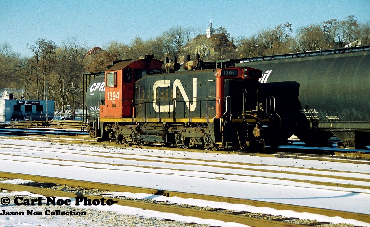 CN SW1200RS 1394 idles away the last day of 1996 in the Brantford yard. The following September, RaiLink Southern Ontario would takeover the operations in Brantford and area including the Burford Spur. In later years, CN 1394 would be repainted yellow and became the plant switcher in the CN steel facility at MacMillan yard in Toronto where it was re-lettered RT 110.