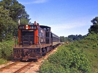 An FCRS (Forest City Railway Society) excursion in June 1970 featured CN GMD1 1915 as seen here on a run-by at Yarmouth on the old L&PS line.