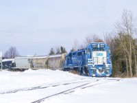 Sky blue geeps on the point as CN 540 shoves back around the wye to drop cars in interchange XT99 for GEXR.  While I enjoy the <a href=http://www.railpictures.ca/?attachment_id=42026>vintage power</a> regularly seen on the Guelph Sub these units contrast nicely with the snow.
