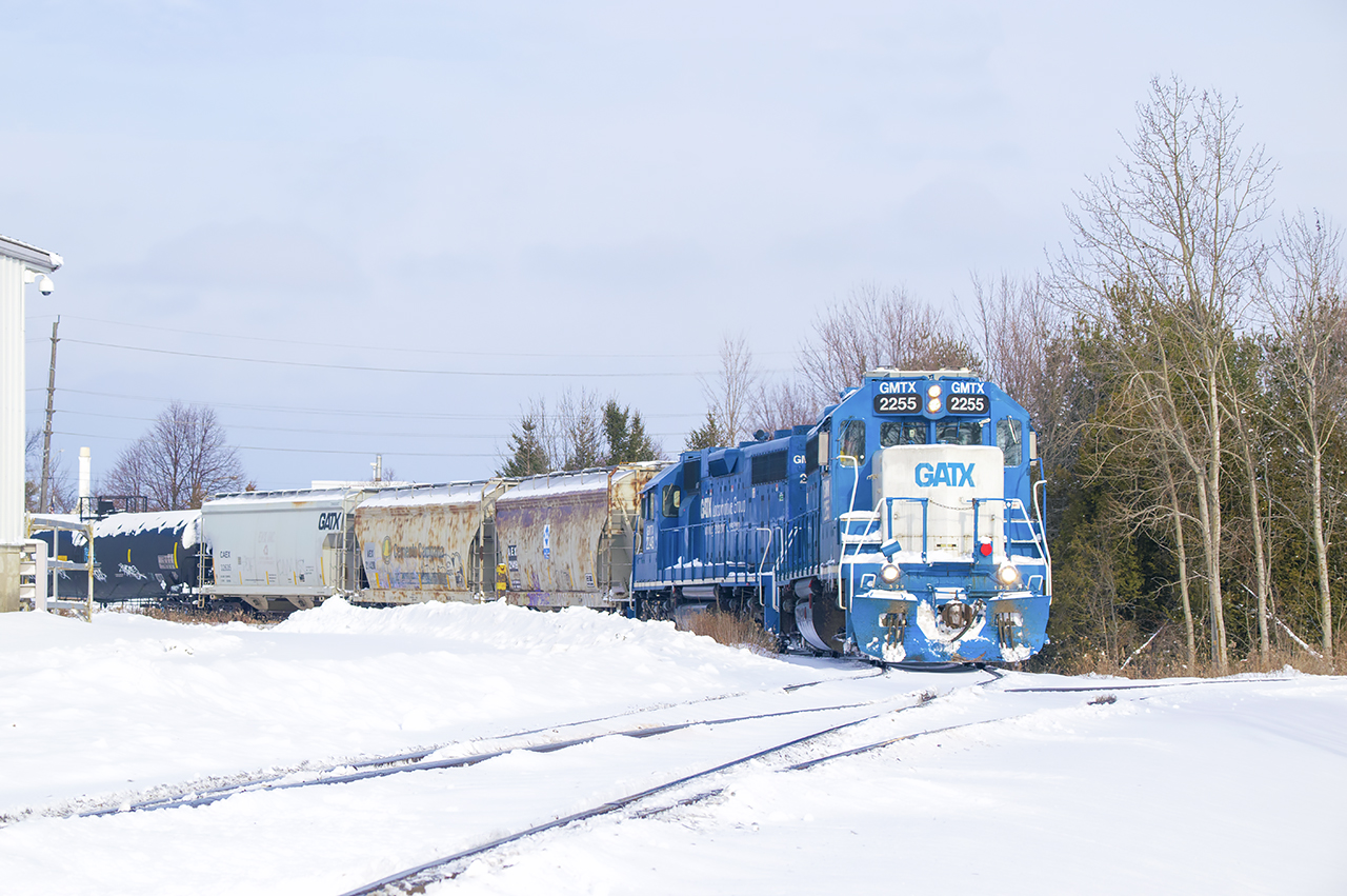 Sky blue geeps on the point as CN 540 shoves back around the wye to drop cars in interchange XT99 for GEXR.  While I enjoy the vintage power regularly seen on the Guelph Sub these units contrast nicely with the snow.