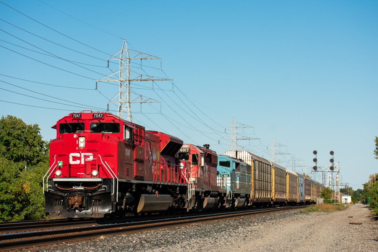 On the 20th of September, a Herzog ballast train headed west on the Belleville Sub with CP 6017 & CMQ 9011, taking a hefty amount of mixed freight, work equipment, and ballast cars to Toronto Yard from points east. In Toronto Yard, CP decided to combine 421 with the ballast train as both trains were destined for Sudbury. Here was the result of said combination, 3 different EMDs all facing forward. As much as I would've preferred an SD40 leader, this was a pretty sweet catch.
