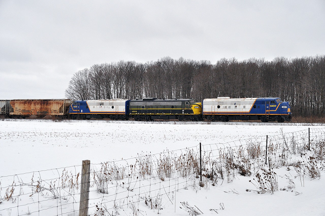I'm not going back very many years for this. Not quite 6 to be exact. But for a brief time these were really entertaining days to be out.  The Ontario Southland pressed all three of their F units into service; and practically everyone with a camera made it trackside while the getting was good. There were some days you just did not feel the cold. Here's the OSR 1400, 6508 and 1401 hustling back to Ingersoll after working the mills at Putnam. Heady days, indeed.