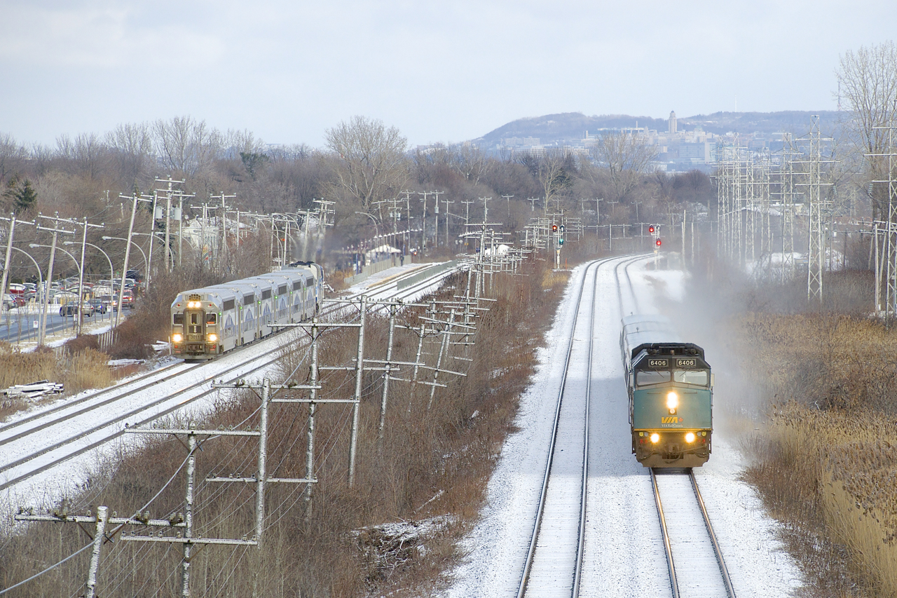 VIA 67 on CN's Kingston Sub is ahead as EXO 61 heads in the same direction on CP's Vaudreuil Sub at left.