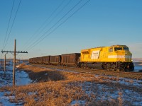 EMDX SD70ACe-T4 #7225 is seen leading CP train 850 through Secretan Saskatchewan in the last light of the day.  60+kmh wind gusts along with normal December temperatures on the prairies made for a very chilly final shot of this chase. These units have often been referred to as "Bananas" by the railfan community, so with that I title this shot.... "Banana In The Freezer".   