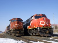 A pair of trains sit parked in Belleville, with a third out of sight at right. At this point in time no trains had passed through here for a couple of weeks due to a protest on CN's main line along Tyendinaga Mohawk territory a bit east of here. 