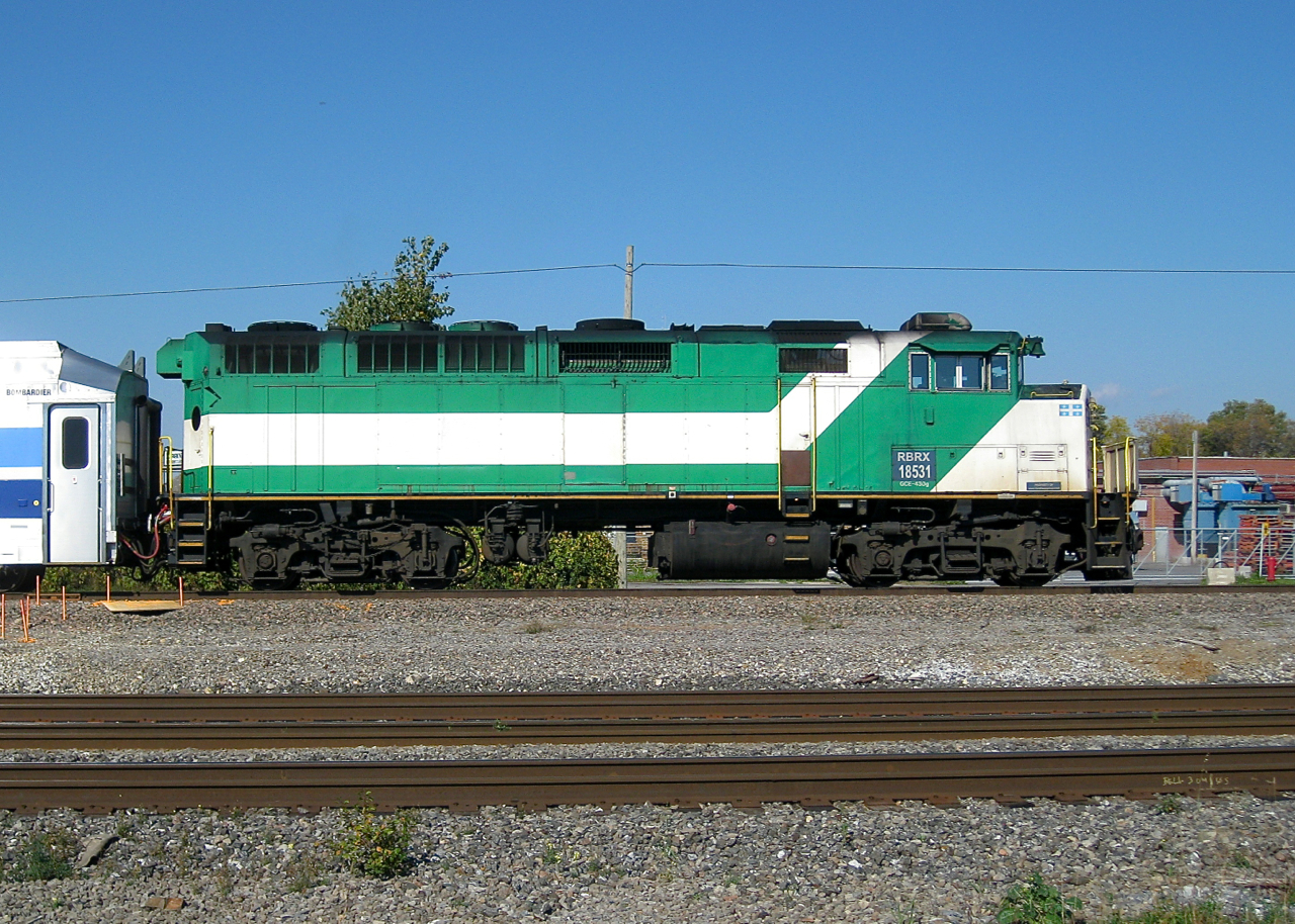 Ex-GO Transit F59PH RBRX 18531 pushes a commuter train towards Dorval Station.