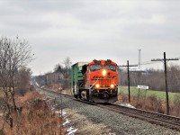 We all knew this was coming and the phone was buzzing for a pumpkin leading through our area. I was rather hoping for a few more cars but I guess one is better than light power. Since it was foreign power, I wanted to get it at a landmark on the Galt sub so the Puslinch name sign seemed a logical spot. Here BNSF 7444 blasts past me on its way eastward for a stop at Hornby.