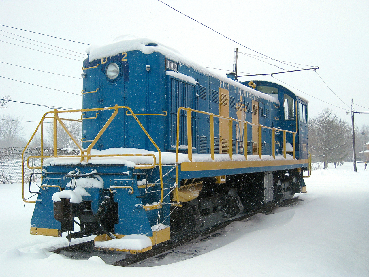 Preserved at Exporail, a Port of Montreal S-3 sits in the snow. At this point in time this engine was used at times to move equipment around. Since then a CN SW1200RSm and a CP GP9 have replaced it for switching duties and it has not run in a number of years.