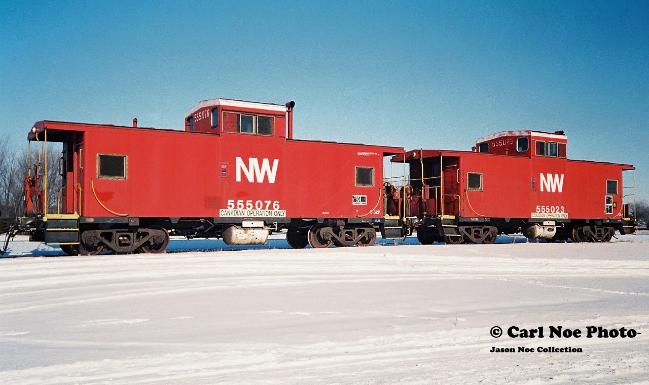 Two NW cabooses share the spolight at St. Thomas after likely coming off trains operating on the CN Paynes and Cayuga Subdivisions. The vans included; NW 555076 and NW 555023 both of which were still lettered for NW. These active vans would continue to be assigned to Norfolk Southern Ontario trains until 1996.