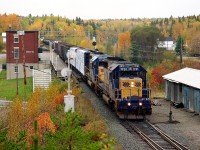 Fall colours in full swing at the end of September in Northern Ontario. It is a beautiful scene as ONR 1731 and 1735 power a train southward on their way from Cochrane to Englehart.
The 1735 is still rolling over the ONR, but 1731 was sold in 2005. Speeder houses and other various outbuildings on the bottom right of the photo have all been removed.