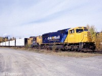 Ontario Northland Railway SD75I 2103 and GP9 1602, ONR's newest power mixed with some of its oldest, are seen leading a train parked at Swastika due to a strike. At the time 2103 was only a year old, while 1602 came out of the same GMD London plant in 1957 and was pushing 42.