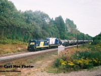 A Southern Ontario Railway (SOR) train is heading west on the CN Dundas Subdivision up the grade at Copetown with RLK 1200 and RLK 1752 with cars for either Brantford or Paris from Hamilton. At the time, the Inksetter Road bridge was undergoing a complete overhaul and was completely removed over the CN mainline. 

Previous image posted seen here:

http://www.railpictures.ca/?attachment_id=40576
