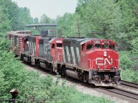 CN 9402, GTW 6421, and an unidentified GP40-2W lead train 333 through Bayview Junction 