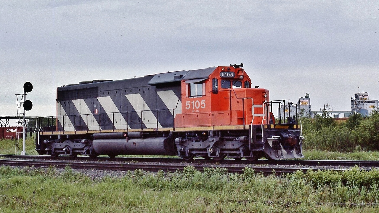 CN 5105 is a 1969 GMD SD40 product, serial #A2364.


 Purchased in 1999 by BNSF ( 1996 merger AT&SF and BN ) renumbered  BNSF 7315. 


 In transfer service at  Thunder Bay  June 18, 1985 Kodachrome by S. Danko


 what's interesting


 seems to me that the CN SD's were primarily western motive power, uncommon in southern Ontario
 

sdfourty